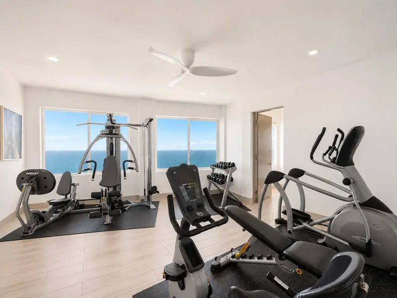 Home gym with ocean views at Villa Lands End
