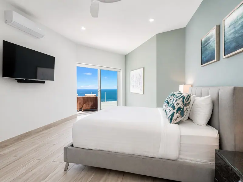 Guest bedroom at Villa Lands End with private ocean terrace